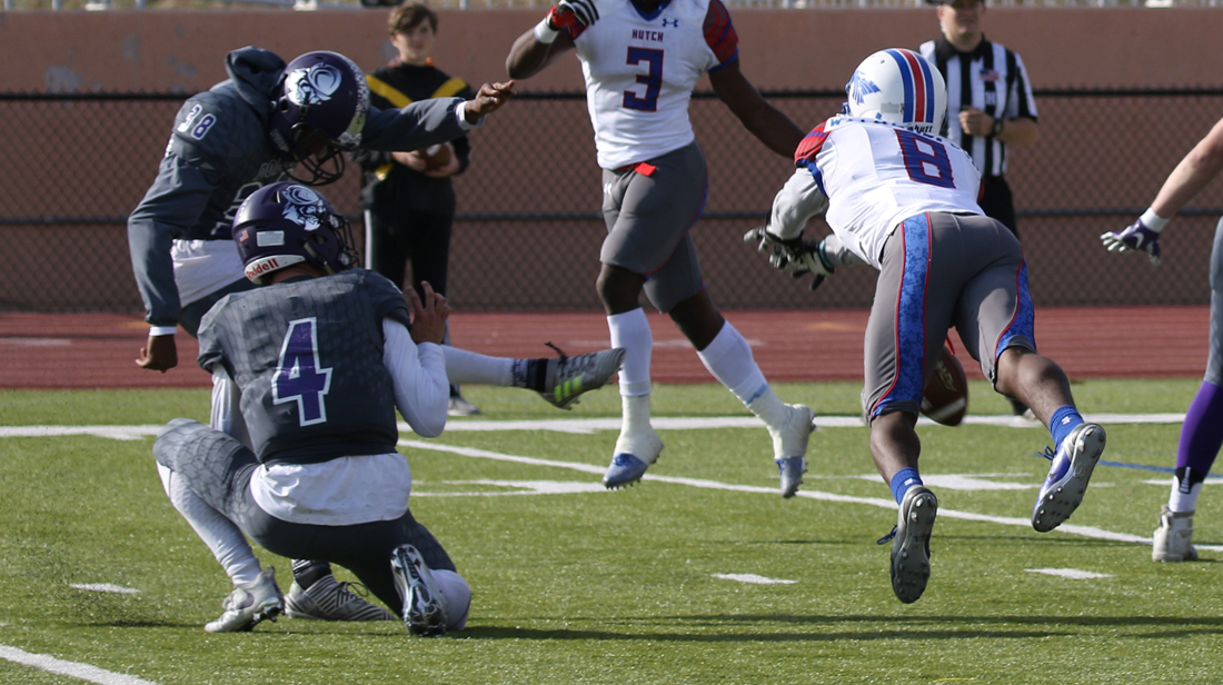 Michael Witherspoon blocks a field goal late in the first half of Hutchinson's 27-6 victory over Dodge City on Saturday in Dodge City. (Joel Powers/Blue Dragon Sports Information)
