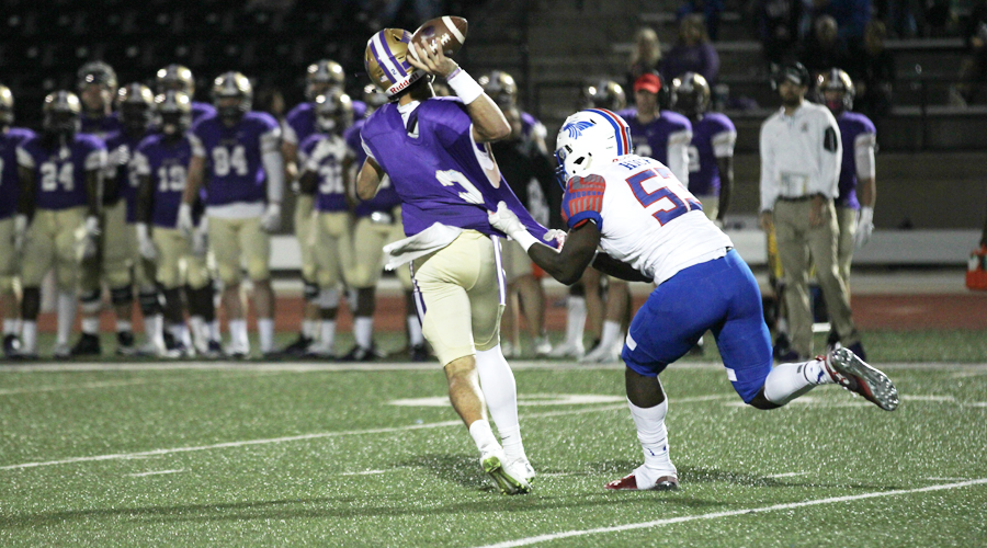 Clarence Hicks puts pressure on Butler's quarterback in the second quarter of Saturday's 27-13 win by the No. 7 Blue Dragons over No. 12 Butler in El Dorado. (Bre Rogers/Blue Dragon Sports Information)