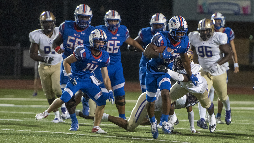 Running back Corey McKnight rushes for yardage in the No. 11 Blue Dragon football team's 43-23 loss to Butler on Saturday at Gowans Stadium. (Andrew Carepnter/Blue Dragon Sports Information)