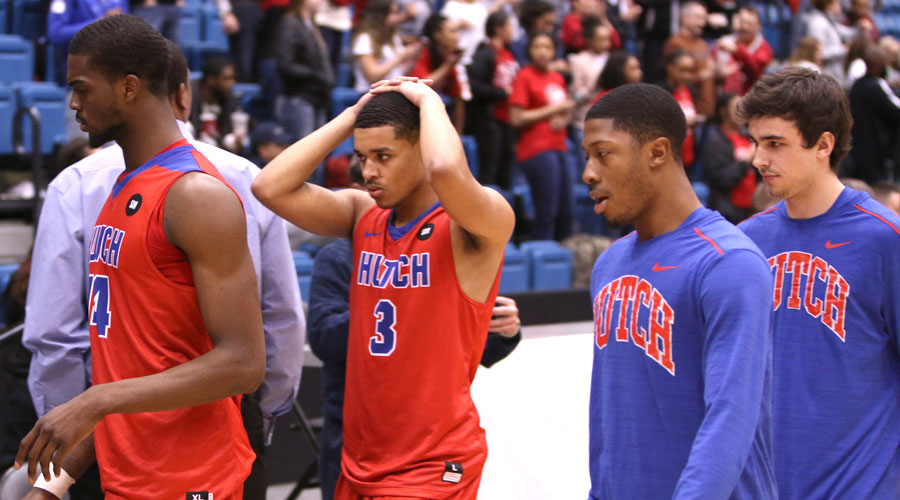 The Blue Dragon men's basketball team reacts to an 82-80 loss to Coffeyville in the Region VI Tournament Championship Game on Wednesday at Hartman Arena in Park City, KS. (Joel Powers/Blue Dragon Sports Information)