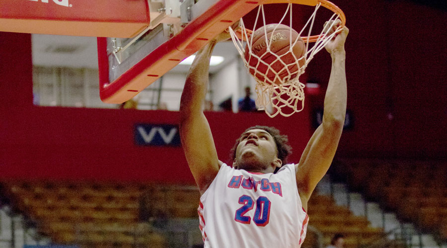Sophomore Kai Mitchell dunks in the first half of No. 1 Hutchinson's 102-56 season-opening victory over the Friends University JV on Wednesday at the Sports Arena. (AllieSchweizer/Blue Dragon Sports Information).
