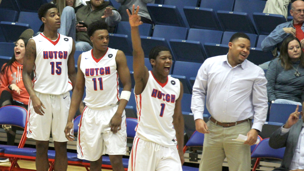 The Blue Dragons celebrate a come-from-behind 60-57 victory over Pratt on Saturday at the Sports Arena. (Bre Rogers/Blue Dragon Sports Information)