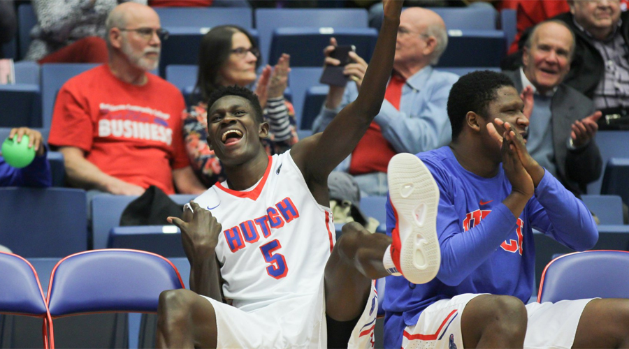 Fred Odhiambo celebrates during the second half of Hutchinson's 82-65 win over No. 19 Barton on Wednesday at the Sports Arena. (Bre Rogers/Blue Dragon Sports Information)