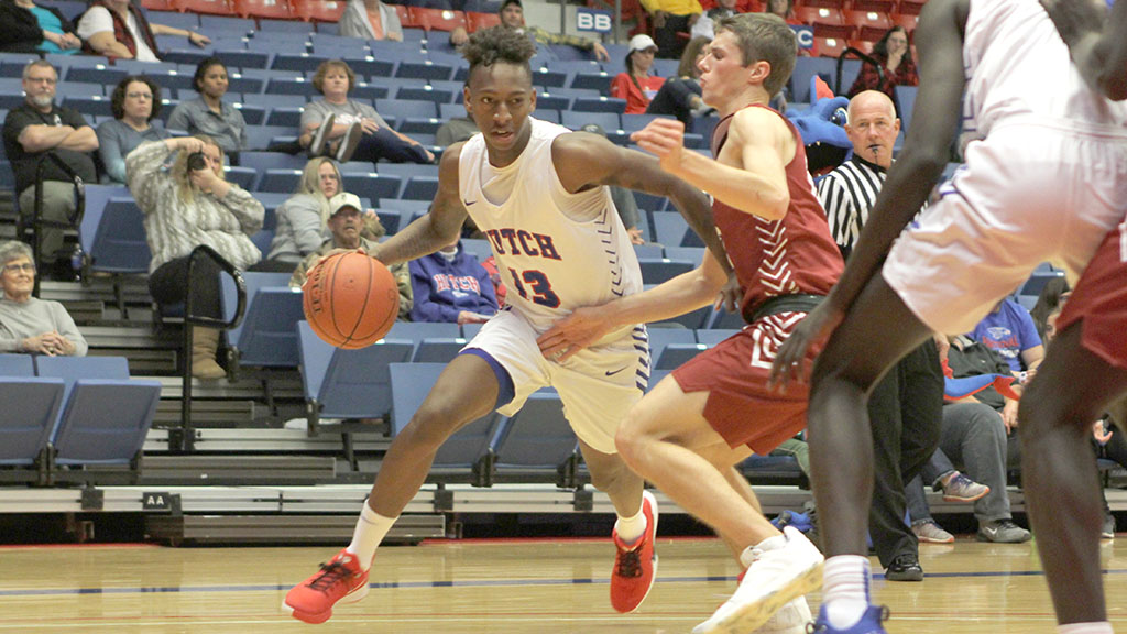 Josh Baker scores a team-high 21 points to lead the No. 4-ranked Blue Dragons to an 87-53 victory over Hesston College on Tuesday at the Sports Arena. (Bre Rogers/Blue Dragon Sports Information)