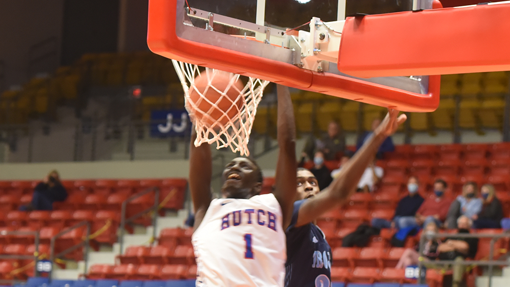 Majok Kuath dunks during a decisive 15-6 run in the second half that carries the Blue Dragon men to a 78-64 Jayhawk West win over Colby on Wednesday at the Sports Arena. (Sammi Carpenter/Blue Dragon Sports Information)