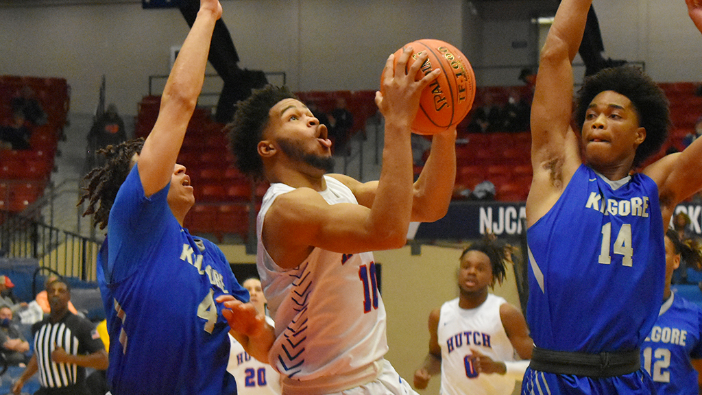 CJ Robinson splits the Kilgore defense for a reverse layup in the second half of Hutchinson's 95-86 NJCAA Tournament opening-round victory on Monday at the Sports Arena. (Kyran Christ/Blue Dragon Sports Information)