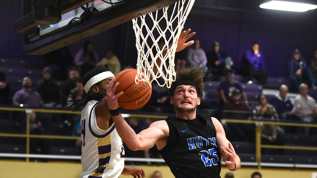 Kernan Bundy drives strong to the hoop in the first half of No. 21 Hutchinson's 63-60 victory at No. 17 Butler on Wednesday in El Dorado. (Steve Carpenter/Blue Dragon Sports Information)