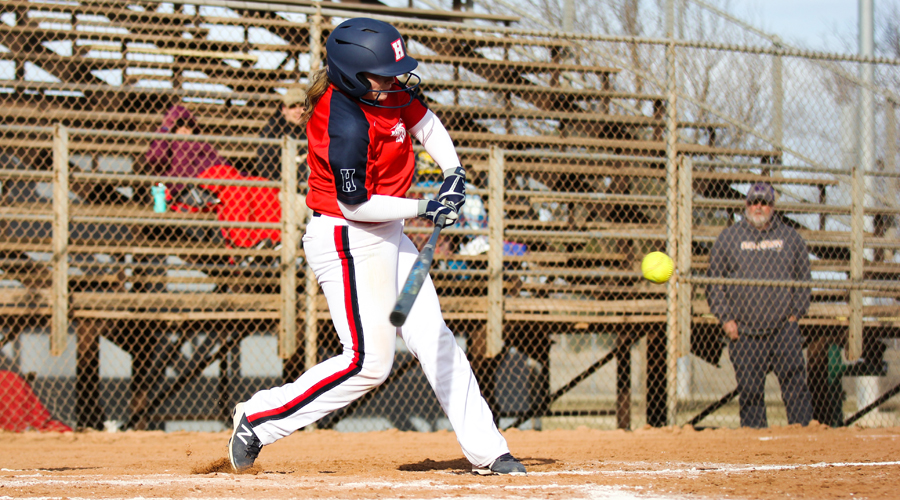 Taylor Ullery drives a two-run base hit in the bottom of the sixth inning to help the Blue Dragons defeat Cloud County 6-4 in Game 1 on Wednesday at Fun Valley. The Dragons completed the sweep in Game 2, 6-1. (Bre Rogers/Blue Dragon Sports Information)