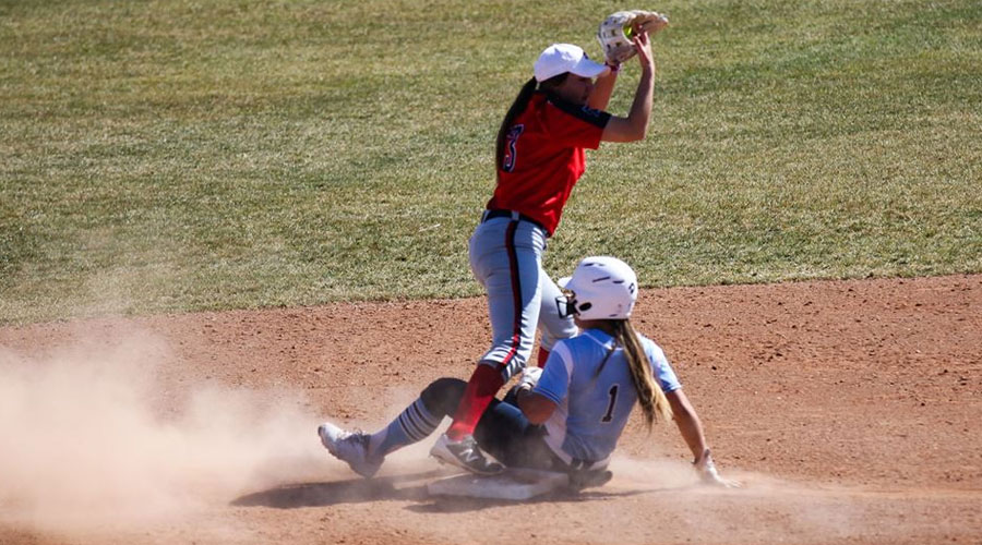 Blue Dragon shortstop Caitlin Schumacher forces out a Colby baserunner in the first game of a Jayhawk Conference doubleheader with Colby on Saturday at Fun Valley. (Bre Rogers/Blue Dragon Sports Information)