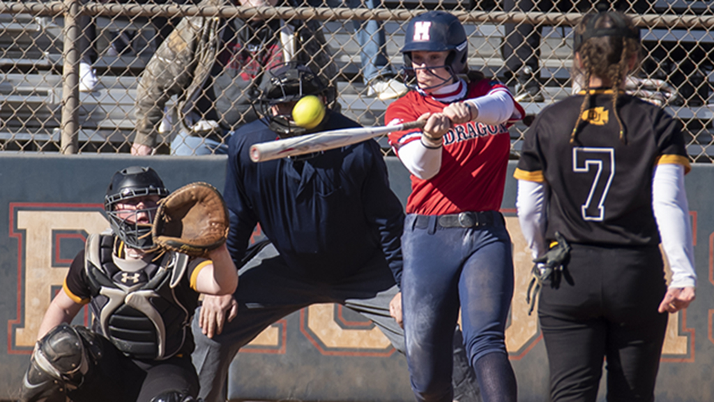 Freshman Aspen Goetz launches a grand slam in the second inning of Game 1 against the Ottawa University JV on Saturday at Fun Valley. The Blue Dragons won 10-0 and 14-4. (Andrew Carpenter/Blue Dragon Sports Information)