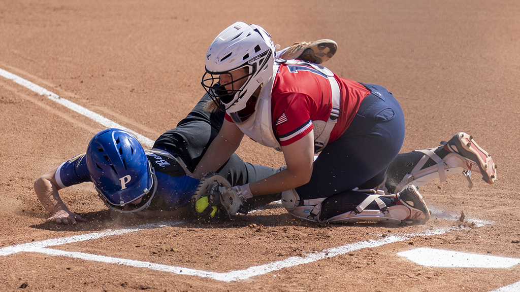 Blue Dragon catcher Allie Stipsits tags out Pratt baserunner Brooklyn Humble at the plate in the first inning of Game 1 of a KJCCC doubleheader on Saturday at Fun Valley. Hutchinson won 8-0 and 9-0. (Andrew Carpenter/Blue Dragon Sports Information)