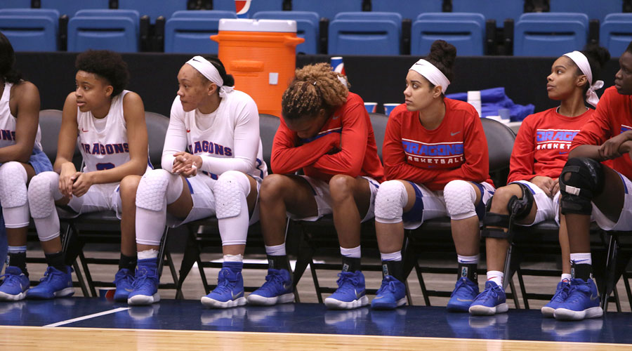 The No. 19 ranked Blue Dragon women look on during a 70-50 Region VI semifinal loss to Independence in Tuesday at Hartman Arena in Park City. (Joel Powers/Blue Dragon Sports Information)