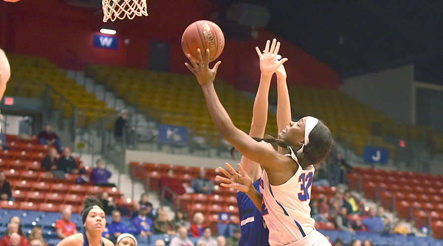 Jada Mickens goes up for a bucket in the third quarter of Friday's 71-50 victory by the No. 6-ranked Blue Dragons over Iowa Western in the Polo Bar & Grill/Blue Dragon Holiday Classic at the Sports Arena. (Andrew Carpenter/Blue Dragon Sports Information)