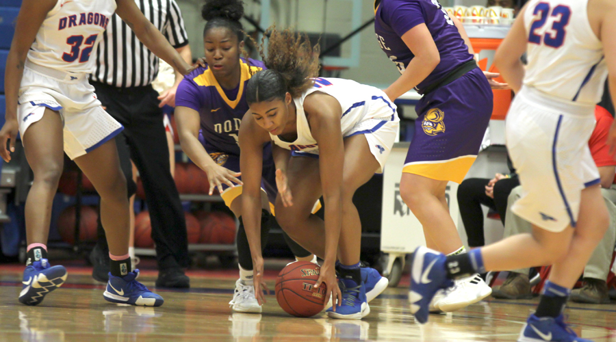 Sophomore Dejanae Roebuck gets one of her career-high six steals in the No. 10 Blue Dragons' 59-31 victory over Dodge City on Wednesday at the Sports Arena. (Bre Rogers/Blue Dragon Sports Information)