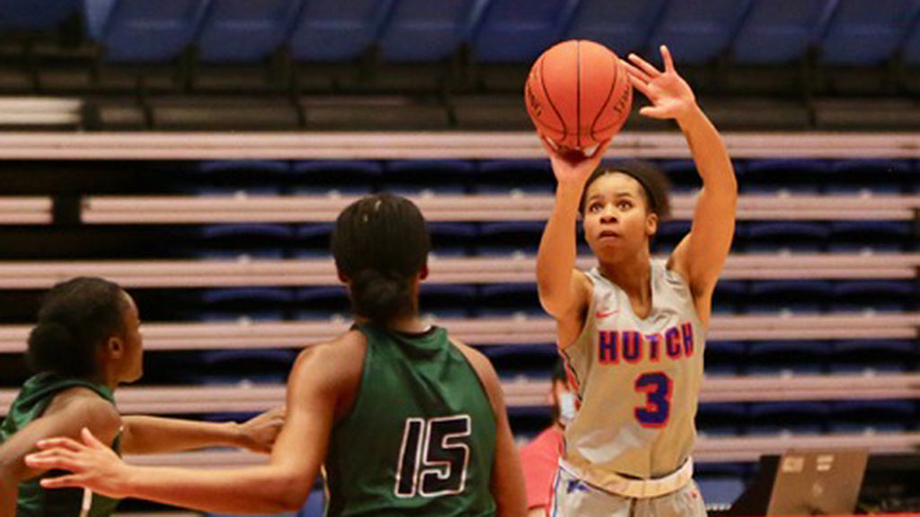 Kalyn Ervin hits a 3-pointer in the fourth quarter to give the Blue Dragons a 63-60 lead. No. 22 Hutchinson defeated Seward County 78-76 on Saturday at the Sports Arena. (Photo by Bob Hunter)