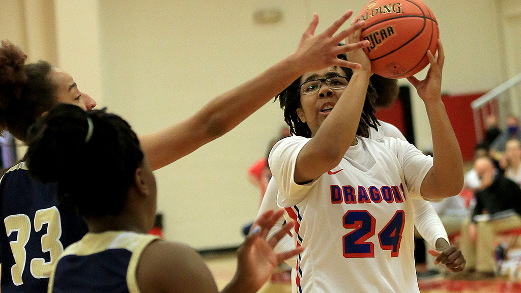 Tor'e Alford scored 17 points in the Region VI semifinals, but the Blue Dragons were eliminated after a 75-56 loss to Independence on Friday in Wichita. (Photo by Sandra Milburn)