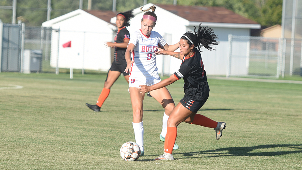 Lani Dickinson battled for possession with a Cowley player in the Blue Dragons' 4-2 loss to the No. 16 Tigers on Wednesday at the Salthawk Sports Complex. (Sammi Carpenter/Blue Dragon Sports Information)