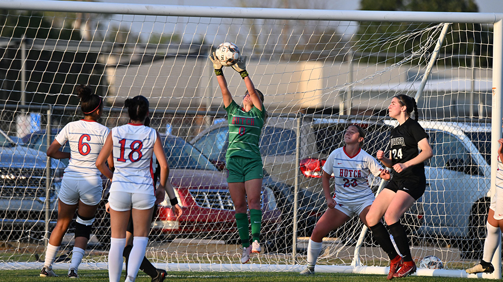 Sophomore goalkeeper Karsyn Slothower goes high to make one of her 11 saves in No. 16 Hutchinson's 0-0 draw with No. 8 Butler on Wednesday at the Salthawk Soccer Complex. (Andrew Carpenter/Digital Fox Photography)