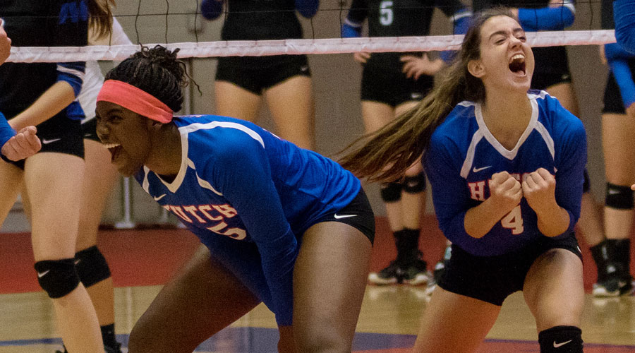 Patricia Joseph (left) and Nina Pevic react to a block against No. 2 Iowa Western on Saturday at the Midwest Superstore/Blue Dragon Volleyball Classic at the Sports Arena. (Allie Schweizer/Blue Dragon Sports Information)