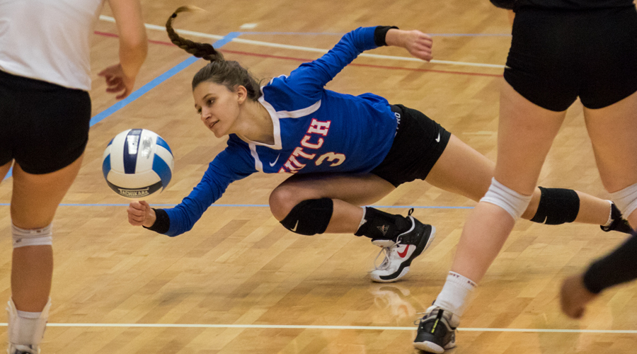 Claira Creach digs a Dodge City attack in the third set of Tuesday's Blue Dragon Region VI Tournament sweep of the Conquistadors at the Sports Arena. (Allie Schweizer/Blue Dragon Sports Information)