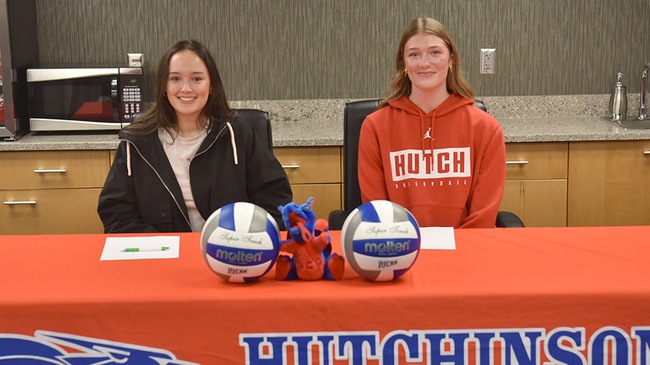 Blue Dragon Volleyball players Giovanna Ravanhani (left) and Anna Dean announced their plans with Newberry College and Pittsburg State, respectively, at a signing ceremony on Monday. (Steve Carpenter/Blue Dragon Sports Information)