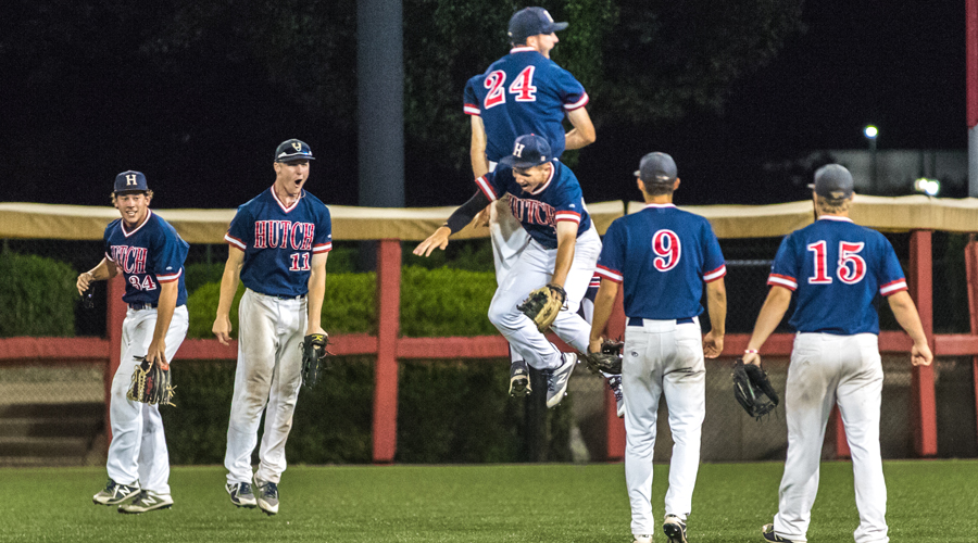 The Blue Dragons celebrate after Julian Rip's game-saving catch in the ninth inning of Hutchinson's 12-11 Region VI/Central District Tournament victory over Johnson County on Sunday night in Wichita. (Allie Schweizer/Blue Dragon Sports Information)