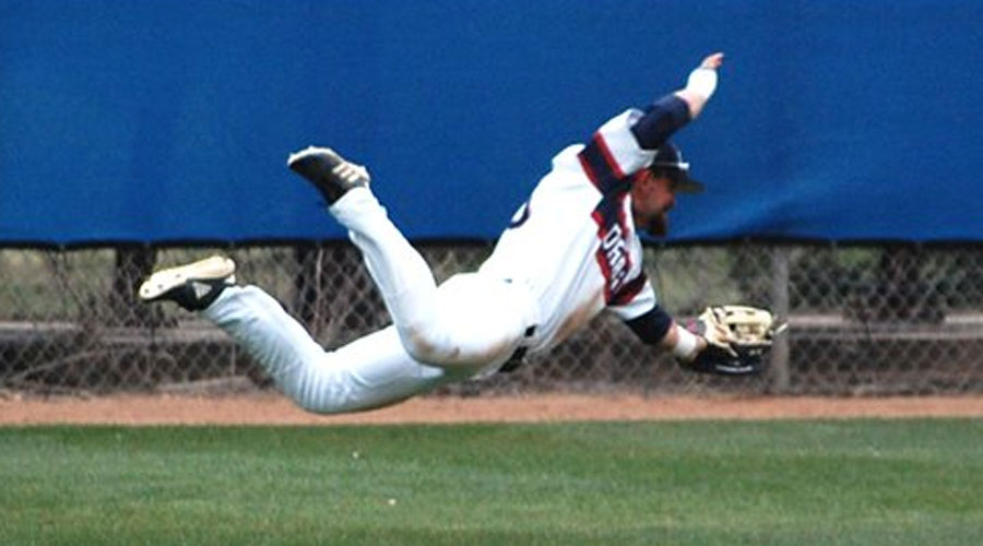 Riley Metzger makes a tremendous diving catch in the seventh inning of Hutchinson's 3-2 victory over Barton on Tuesday at Hobart-Detter Field. (Casey Bailey/Blue Dragon Sports Information)