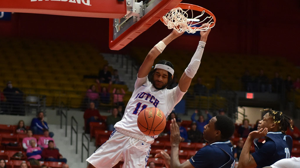 Jacquez Yow followed a missed 3-pointer with a dunk to give the Blue Dragons the lead in overtime on Saturday at the Sports Arena. Hutchinson defeated Colby 104-99 in overtime. (Sammi Carpenter/Blue Dragon Sports Information)