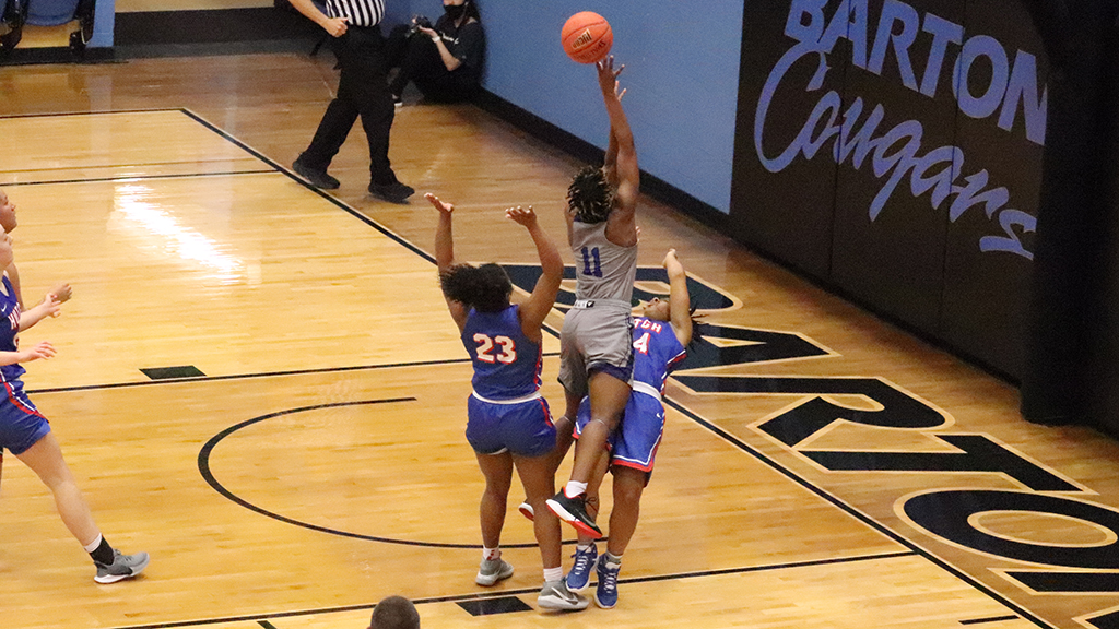 Tor'e Alford takes a charge in the second half of the Blue Dragons' Monday matchup at Barton. The Blue Dragons lost 77-58. (Todd Moore/Barton Sports Information)