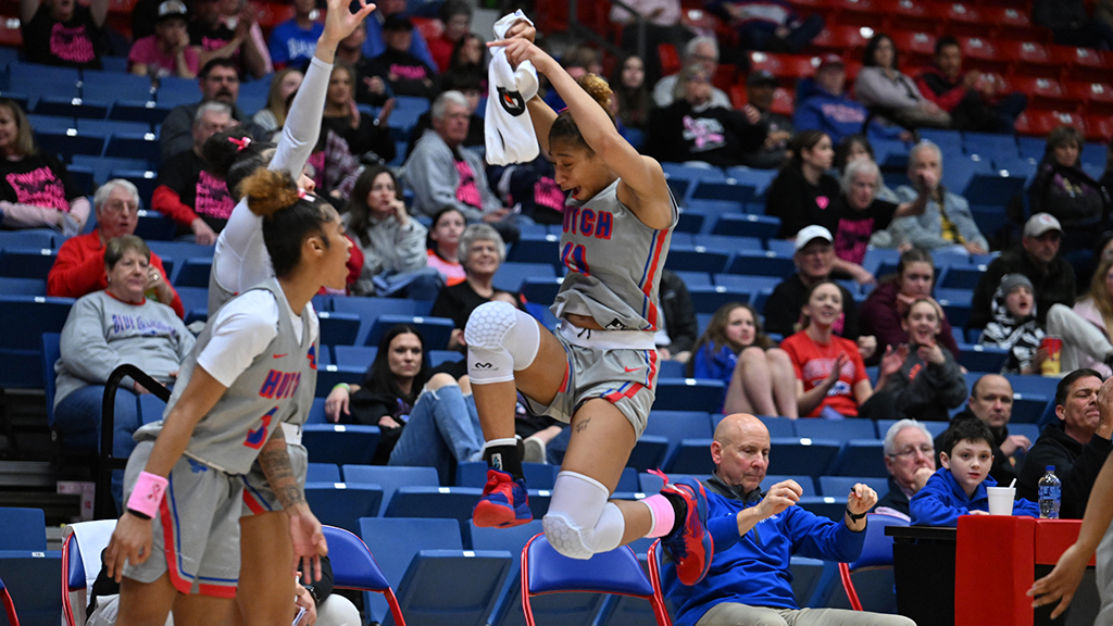 The Blue Dragon women's basketball team celebrates a 92-62 victory over the Cloud County Thunderbirds on Saturday at the Sports Arena. (Andrew Carpenter/Blue Dragon Sports Information)